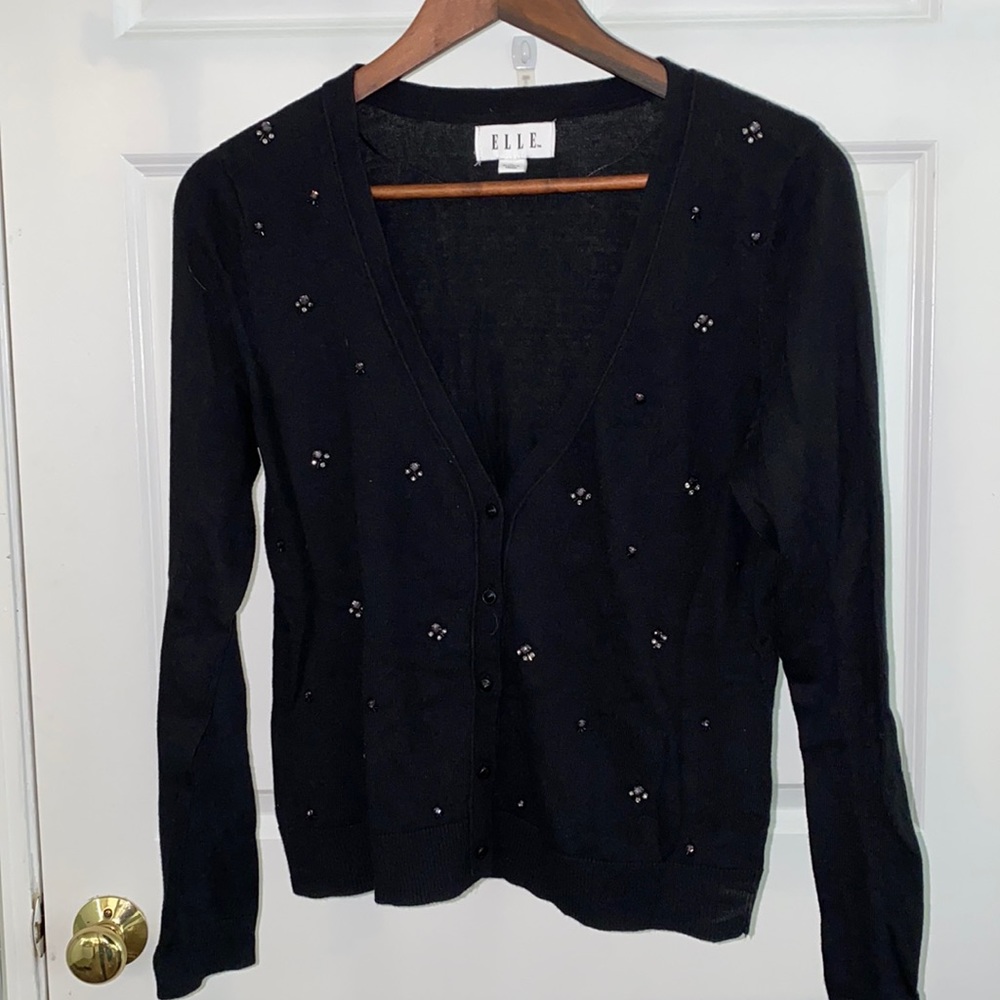 Black sweater with rhinestone